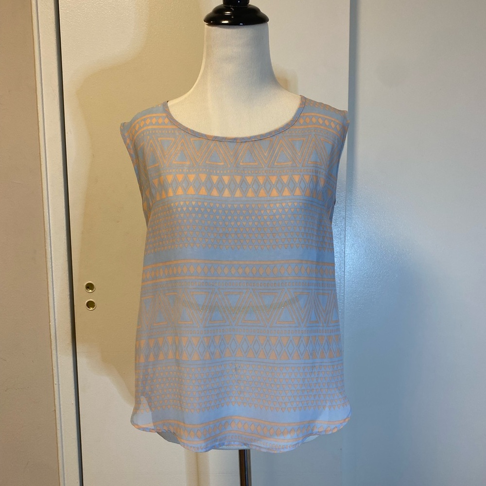 Coral & baby blue sheer tank // button & strap details on upper back